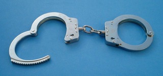 800px-Handcuffs01_2003-06-02.jpg.jpeg