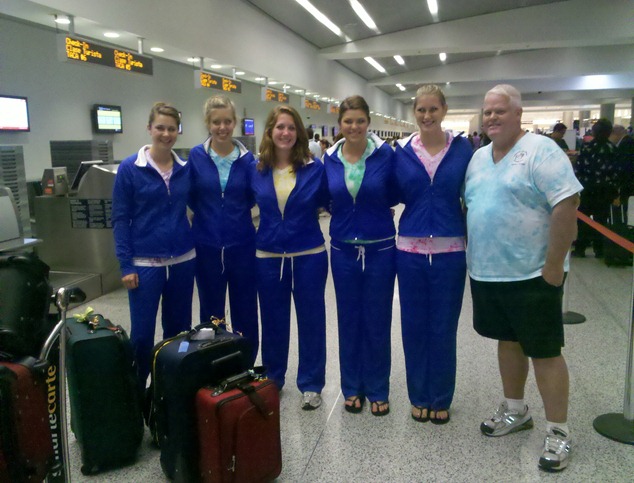 team picture at the Miami airport