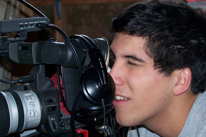Alex Lerma Alex Lerma peering through a Canon XL 1