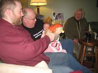 Cora loves her Where the While Things Are puppet from Nana and Papa