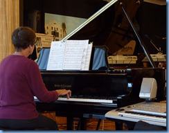 Club Secretary, Colleen Kerr, playing the grand piano