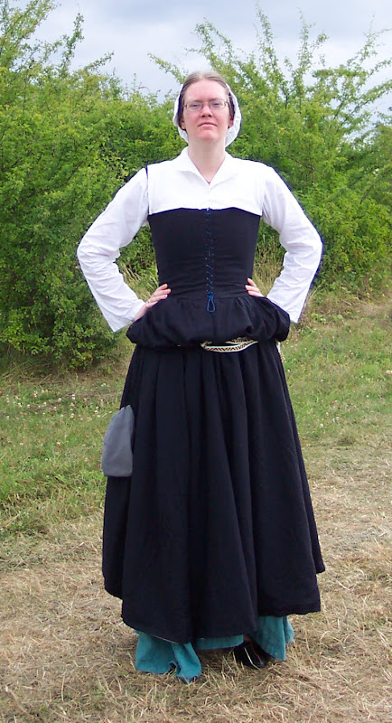 With the skirt blouse over a belt