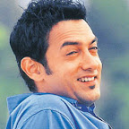 Indian superstar Aamir Khan (L) with co-star Preity Zinta is seen in an undated picture from the movie 'Dil Chahta Hai' (The Heart Desires). After taking the box office by storm with his period film 'Lagaan' (Land Tax)  Bollywood actor-producer Aamir Khan has stepped back into the modern world in his latest movie 'Dil Chahta Hai' which is to be released next week.    REUTERS/Handout