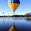 Balloon Reflection by Bryan Rasmussen - Artistic Objects Other Objects ( hot air balloon, reflection, sky, blue, ripple, lake, yellow, balloon )