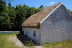 A thatched roof cottage at the Muckross Farms