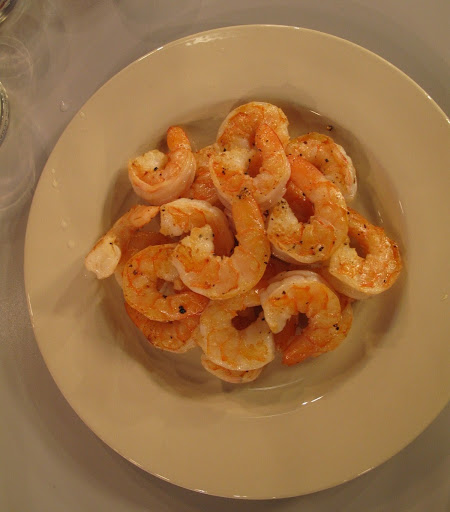 The shrimp are sauteed in olive oil.