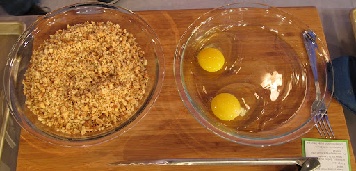 The ingredients for the peanut-crusted chicken breasts - Boneless/skinless chicken breasts are first dipped into beaten egg and then dredged in chopped peanuts mixed with breadcrumbs.