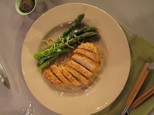Delicious peanut-crusted chicken breast served with lemon-zested asparagus