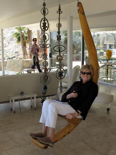 Taking a rest on a swing made of exotic wood