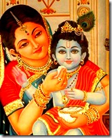 Mother Yashoda feeding Krishna