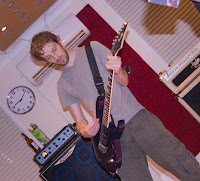 Yes someone gave the drummer a guitar