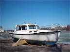 Old boat by the bank