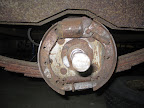 7" x 1 3/4" drum brakes. I have a feeling this whole assembly will be getting replaced due to the small difference in cost