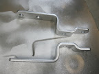 The rear actuator arms. I haven't re-painted the front ones, but they are only about 3" long and straight.