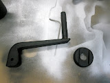 Hitch jack handle and cap.
