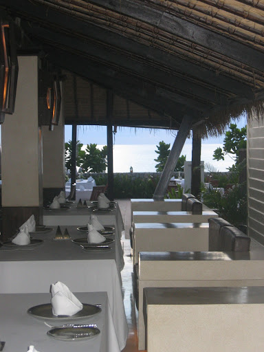 a restaurant with tables and chairs