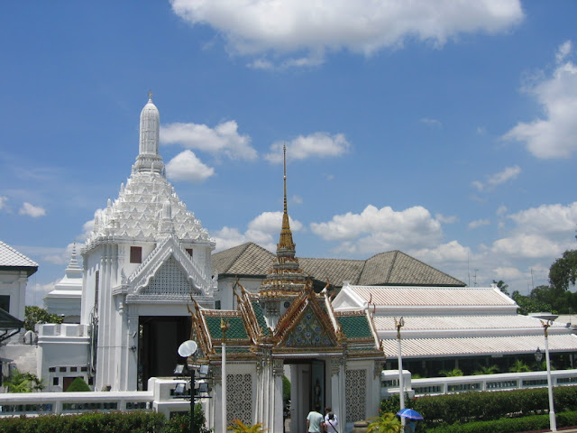 a white building with a tall spire