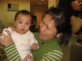 One of the “hair girls” with her baby