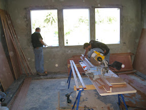 The kitchen... no cabinets yet! Just a bunch of boards.