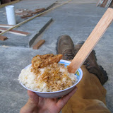 Lunch is rice, chicken and handmade plywood "spoon".