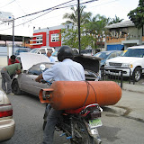 You can carry anything on a moto. And you can't go far without seeing a broken down car.