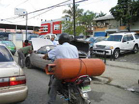 You can carry anything on a moto. And you can't go far without seeing a broken down car.