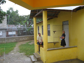 Erika and Chris take shelter from the rain.