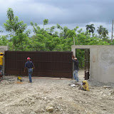 More of the gate being installed.