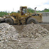 After 45 minutes of moving the rock by hand, this guy shows up.