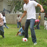 Recess!  Johan plays soccer with Kendry.