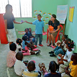 Lauren and Marnelia doing the Morning Meeting with the kindergarten class.