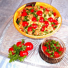 Warm Couscous, Sausage and Chickpea Salad with Cherry Tomato Vinaigrette