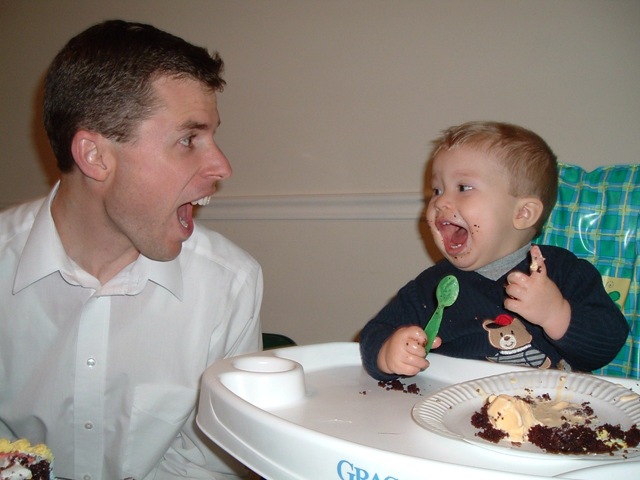 [20050109-18 Hyrum and Daddy agree on the merits of ice cream[4].jpg]