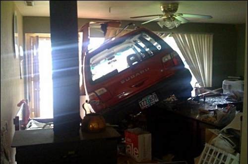 [car-crashing-houses-2[4].jpg]