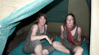 Here they sit in their tent on their bedrolls, enough space for the luggage as well. tonight is the last night camping, the tour is nearly over, all wnet well. Right now we hear hippos on the Caprivi side. the frogs are crocking and we had beef sirloin steaks .