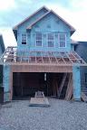 The roof is on and windows are in