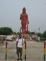 In front of a statue of Hanuman, Delhi.