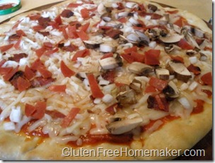 pizza with toppings unbaked