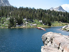 Cliff diving at Booth lake. Vogelsang peak in the distance.