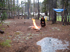 Stoking the fire after the storm came through.
