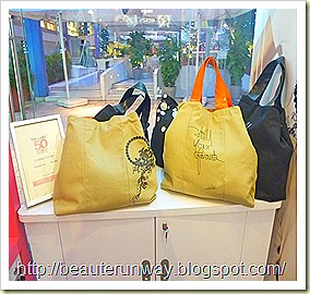 her world 50th anniversary tote bags