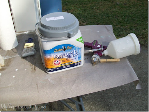 10) Spray (outdoors) doors and drawer fronts with latex paint.
