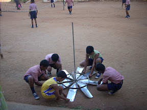 Kids working on the windmill