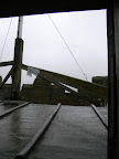 Emerging through the crawl space at the top of the stairs and onto the tower roof. Emerging through the crawl space at the top of the stairs and onto the tower roof.