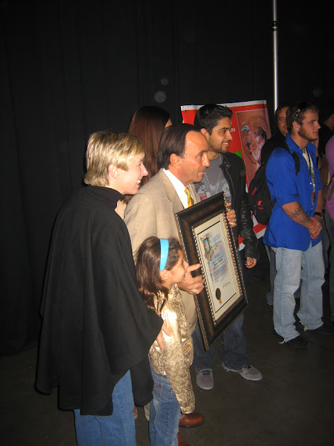 The Artist Receiving A certificate from the Mayor Antonio Villarraigosa