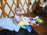 Juliet playing with her toys