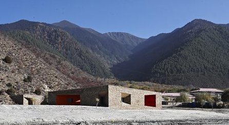 The centre for visitors on the bank of the mountain river