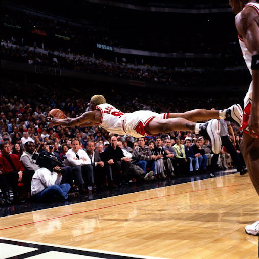 NBA Bulls' Dennis Rodman flying