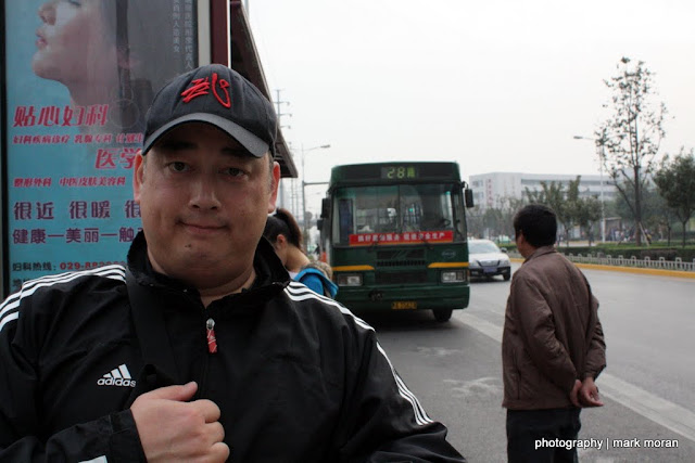 Waiting for another bus and another adventure