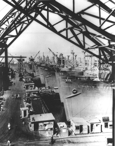 [Victory cargo ships are lined up at a US west coast shipyard for final outfitting 1944[4].jpg]